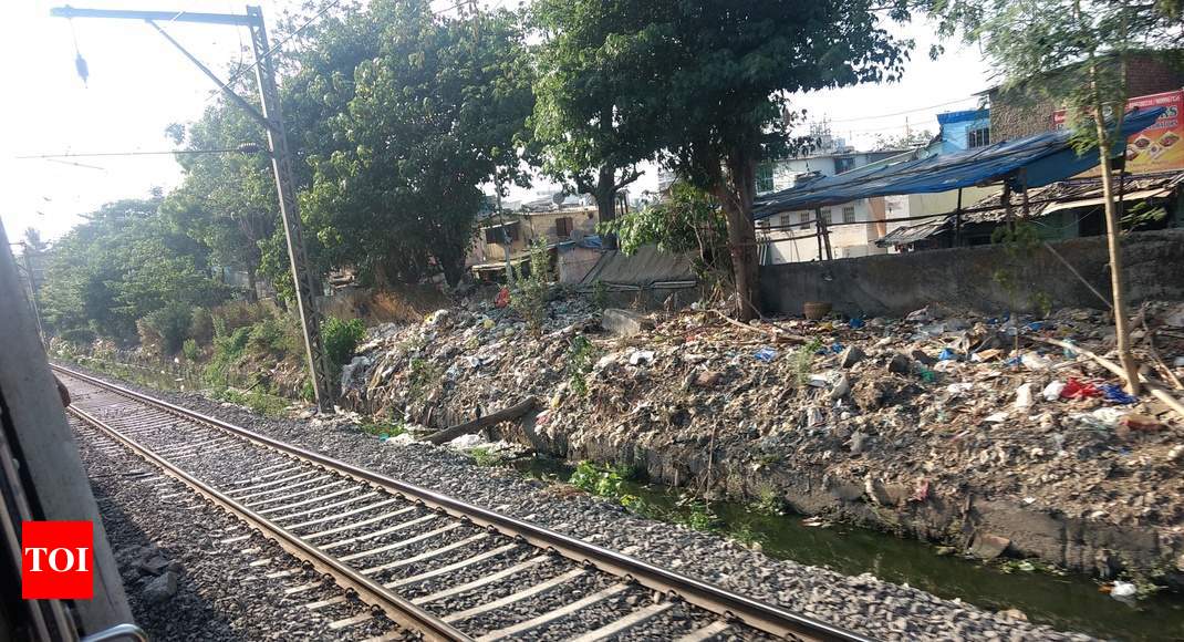 Garbage Along Train Tracks - Times of India