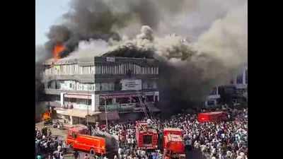 Surat fire tragedy: Three govt officials, one builder held