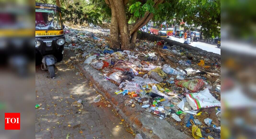 garbage opposite school & church - Times of India
