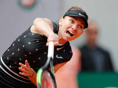 Halep blown out of French Open by teenager Anisimova