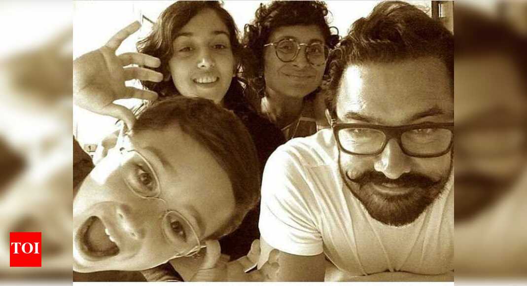 Kiran Rao poses for an all-smiles family picture with Aamir Khan ...