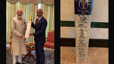 PM Narendra Modi presents Maldives President a cricket bat