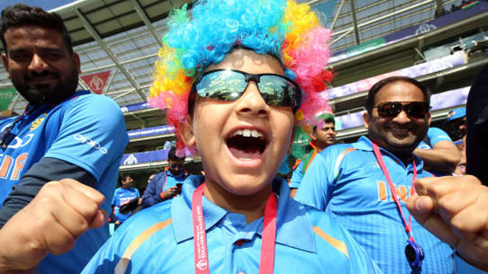 Young fan cheers in support for Indian team