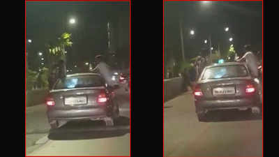 Caught on camera: Three Mumbai youths hang out of car window with drinks, arrested