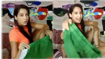'Dilbar' girl Nora Fatehi turns street vendor in Bangkok, tries her hand at selling clothes in local flea market