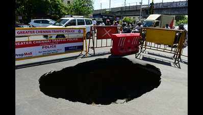 Traffic affected after road caves in at Madhya Kailash junction in Chennai