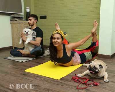 Add more paw-sitivity and laughter to your practice with pet yoga