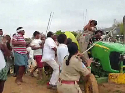 Mob thrashes woman forester, cops look on