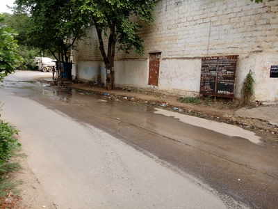 Overflowing Sewage on the Telangana Foods Road.
