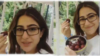 Sara Ali Khan enjoys sumptuous plums while listening to Kartik Aaryan's song