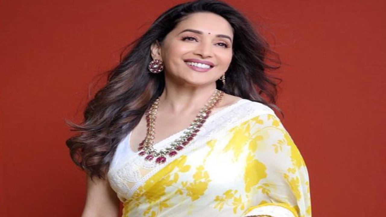 Madhuri Dixit looks like a ray of sunshine in a yellow mirror work