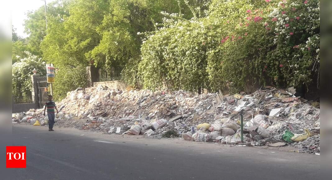 Growing trash pile Times of India