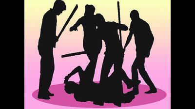 Villagers thrash students who snatched chain
