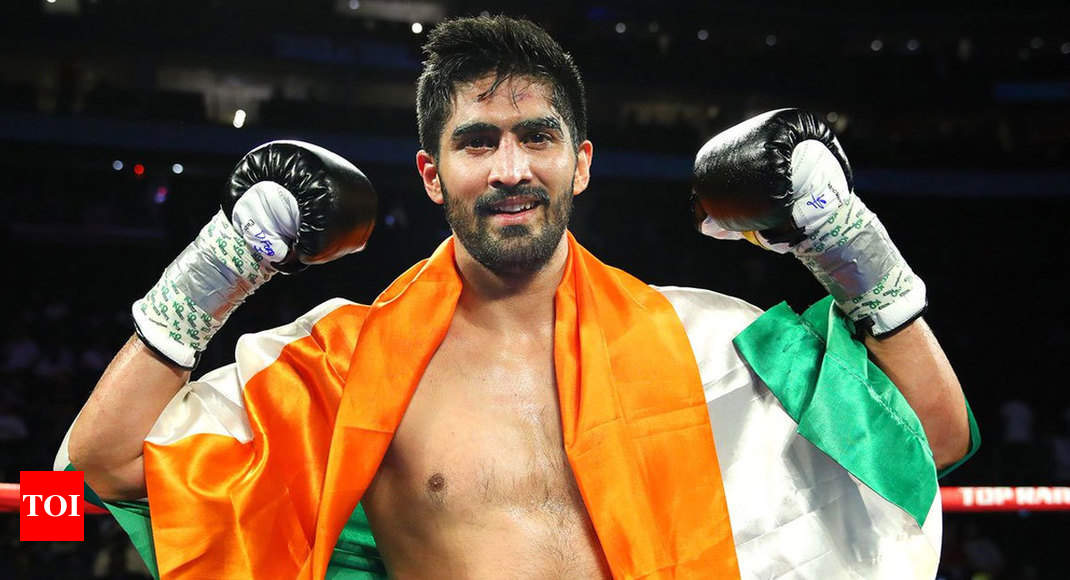 Boxer Vijender Singh wins 11th consecutive pro bout | Boxing News - Times of India