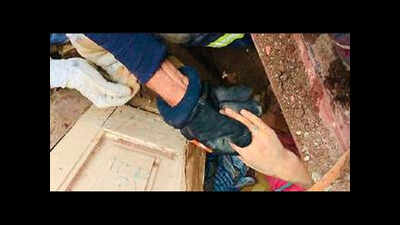 Firemen spotted hand under debris, pulled out mom after 3-hour ...