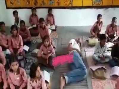 Up Photos Of Teacher Sleeping In Class Go Viral Suspended Lucknow News Times Of India