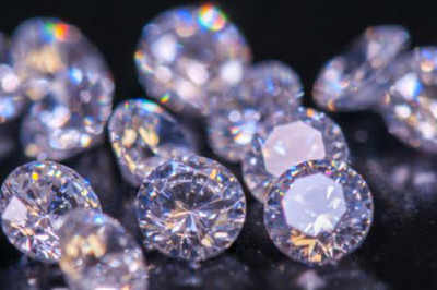 Indian diamond market loses sparkle, De Beers lowers output forecast