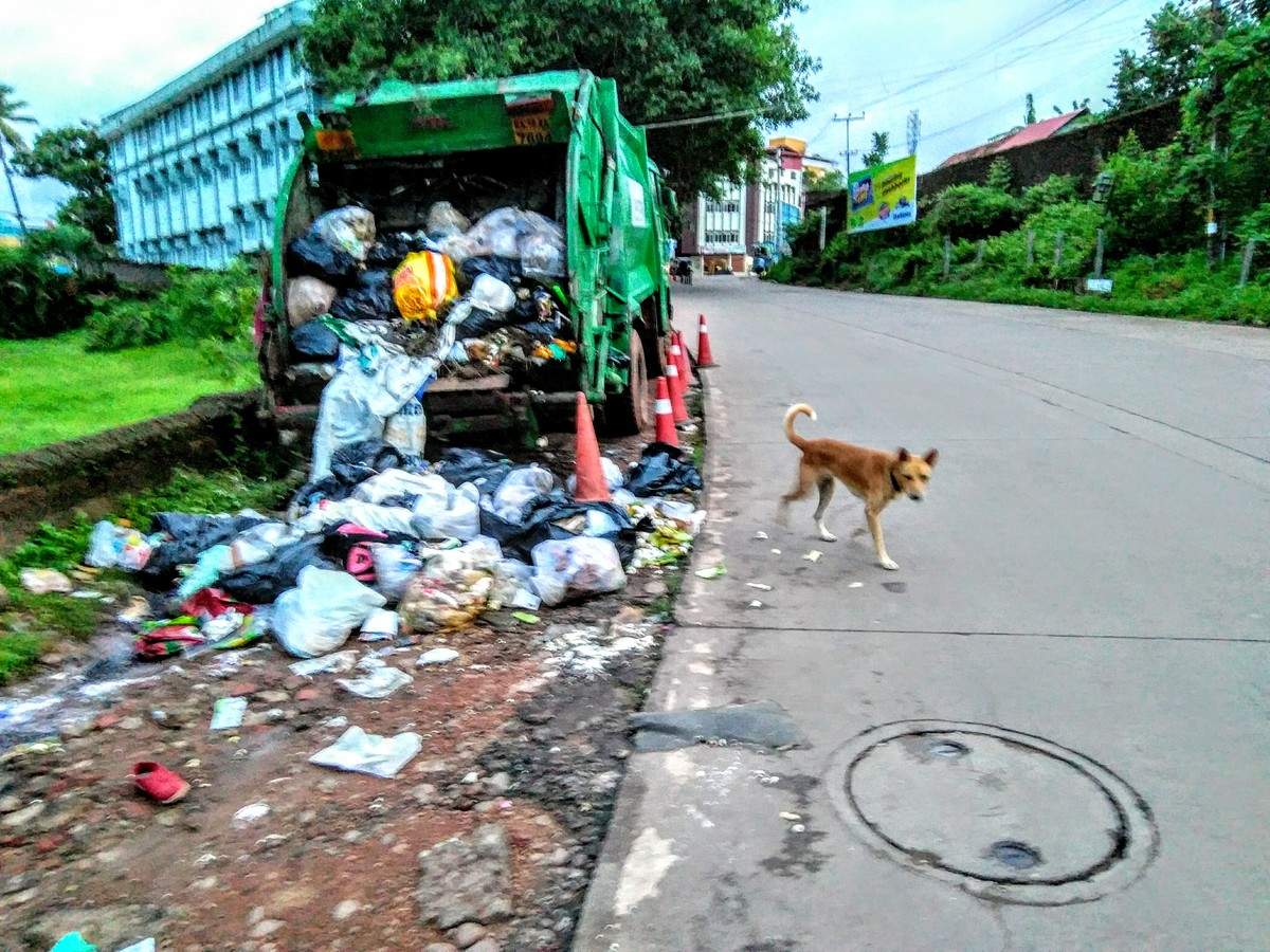 Garbage vehicle parking - Times of India