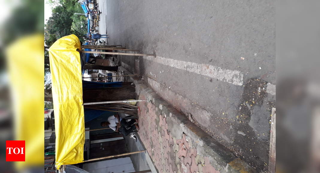 Footpath And Part Of The Road Encroached By Shops Times Of India