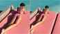 Mandira Bedi flaunts her curvacious body in neon pink bikini!