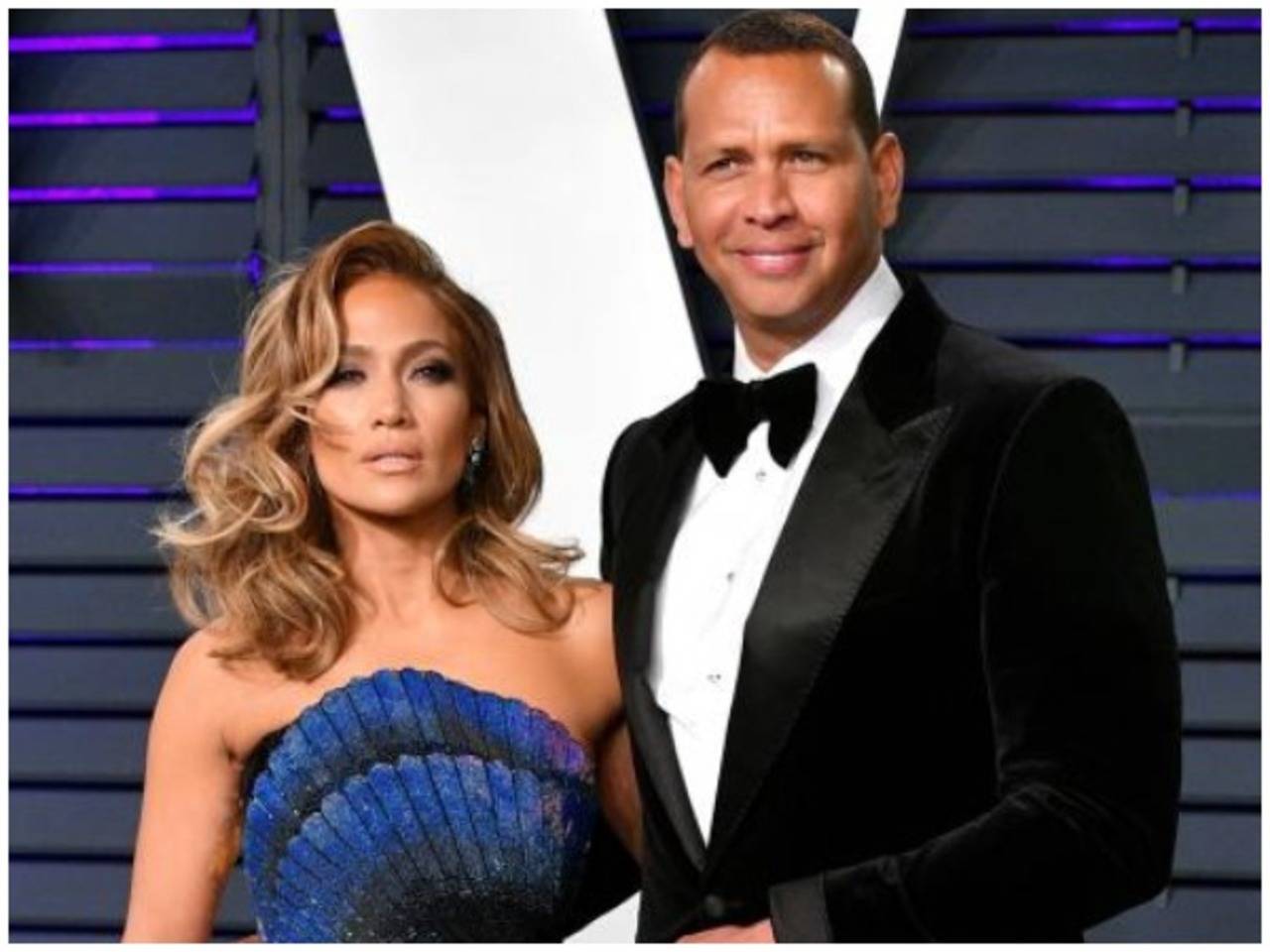 Alex Rodriguez Kisses Jennifer Lopez At Her 50th Birthday Party