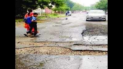 Rains leave holes on roads