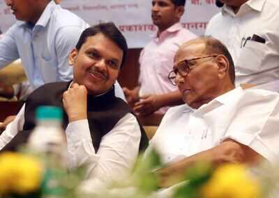 Sharad Pawar shares stage with Devendra Fadnavis, praises his speeches |  India News - Times of India