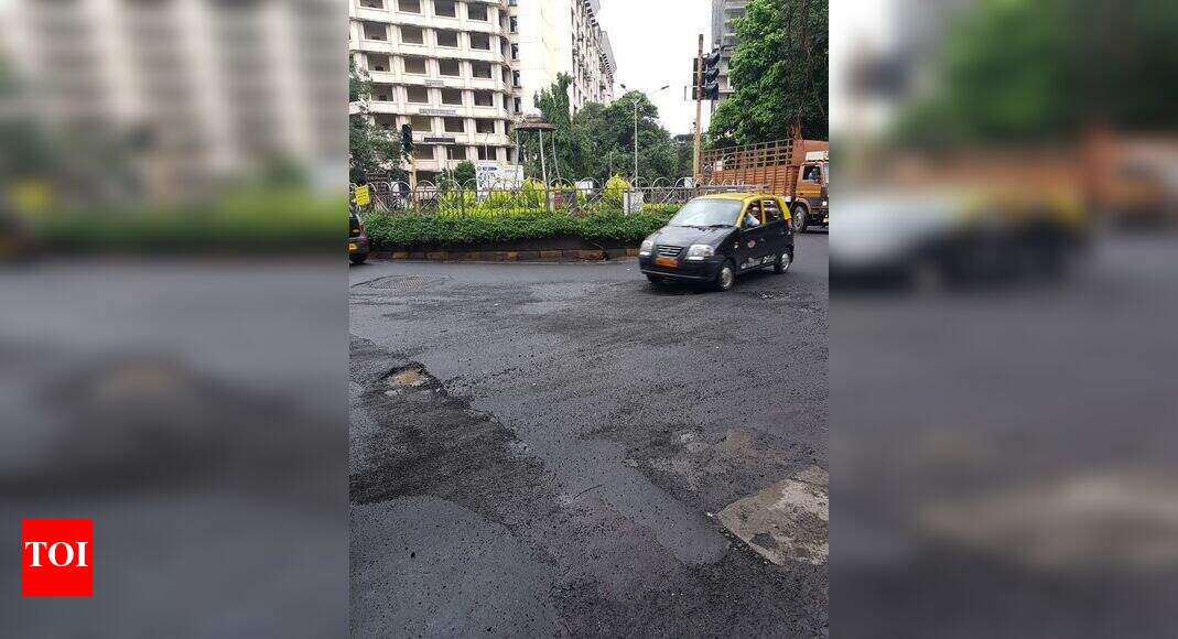 huge craters outside sales tax office, mazgaon Times of India