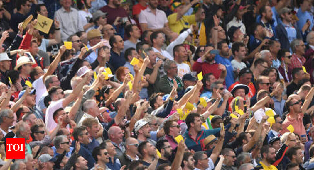 Ashes: English crowd wave sandpapers at Warner