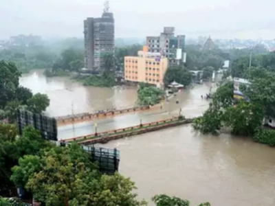 Flood-hit Vadodara limps back to normalcy; Prime Minister Narendra Modi talks to Gujarat CM