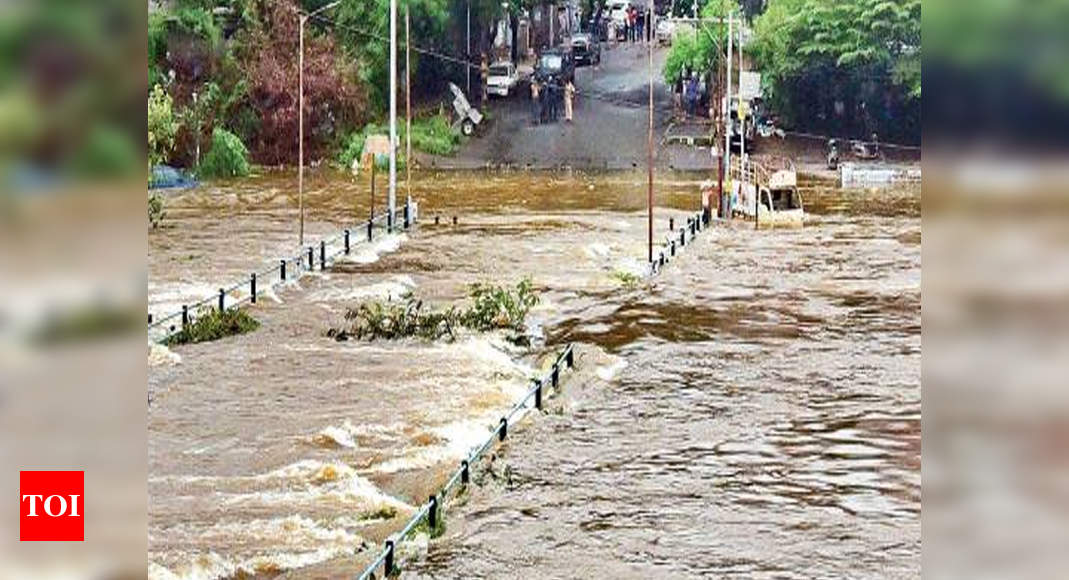 Mutha river swells as rain adds to dams’ stock | Pune News - Times of India