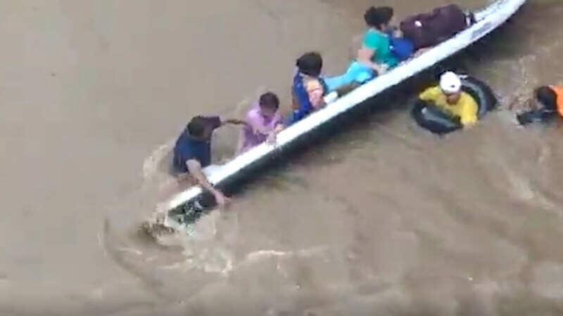 Video: Boat carrying women rescued from flood-hit areas capsizes
