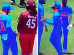 Virat Kohli dances with Chris Gayle as rain interrupts play