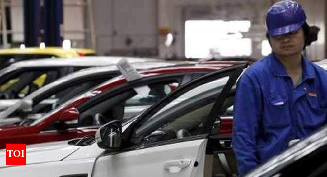Top automakers plan production cuts amid crisis