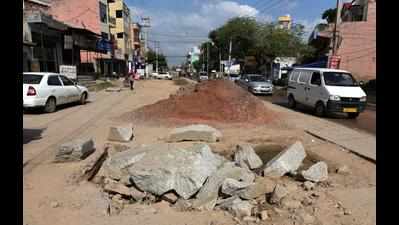 A month on, work on laying pipes still clogs Basai Road