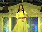 Expats walk the ramp for a fashion show