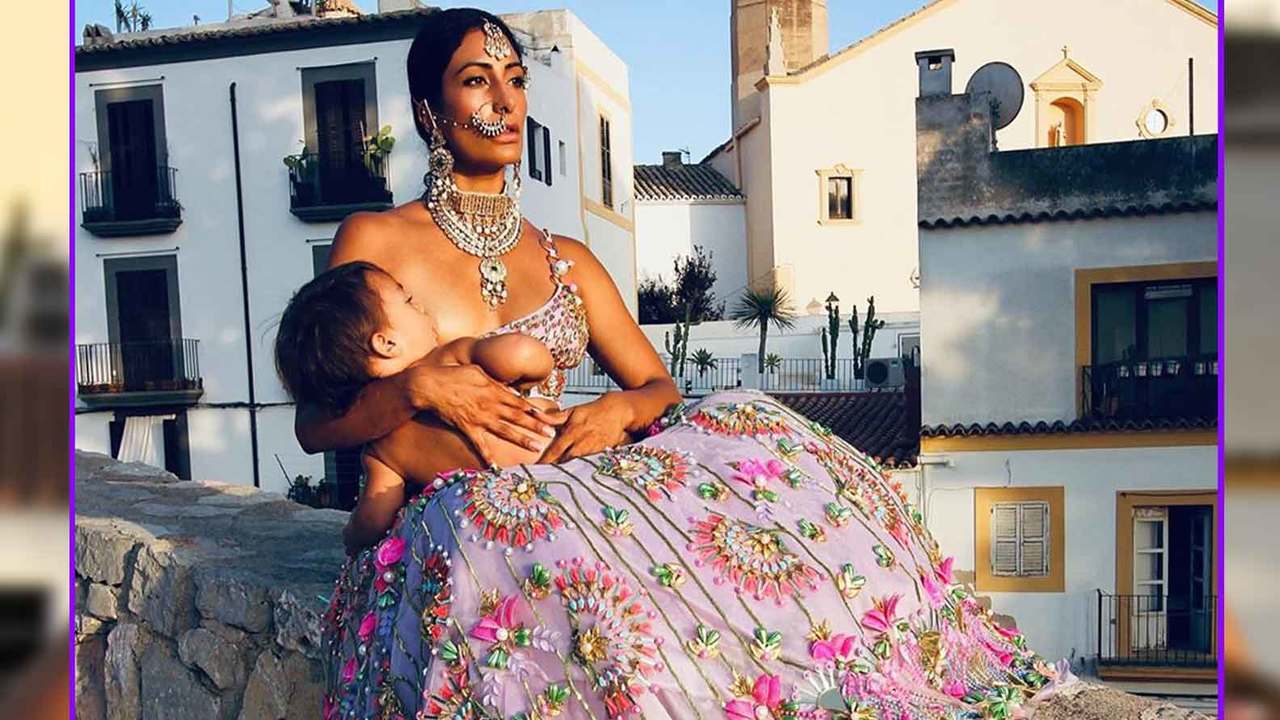 Asian beauty Shayoon Mendeluk breastfeeds son donning magnificent  traditional attire