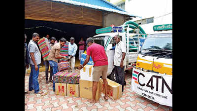 Volunteer group rushes relief materials to rain-hit areas