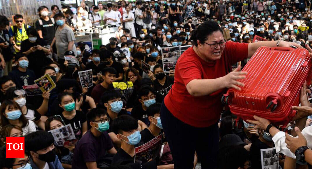 Hong Kong airport suspends check-in operations amid protests - Times of India