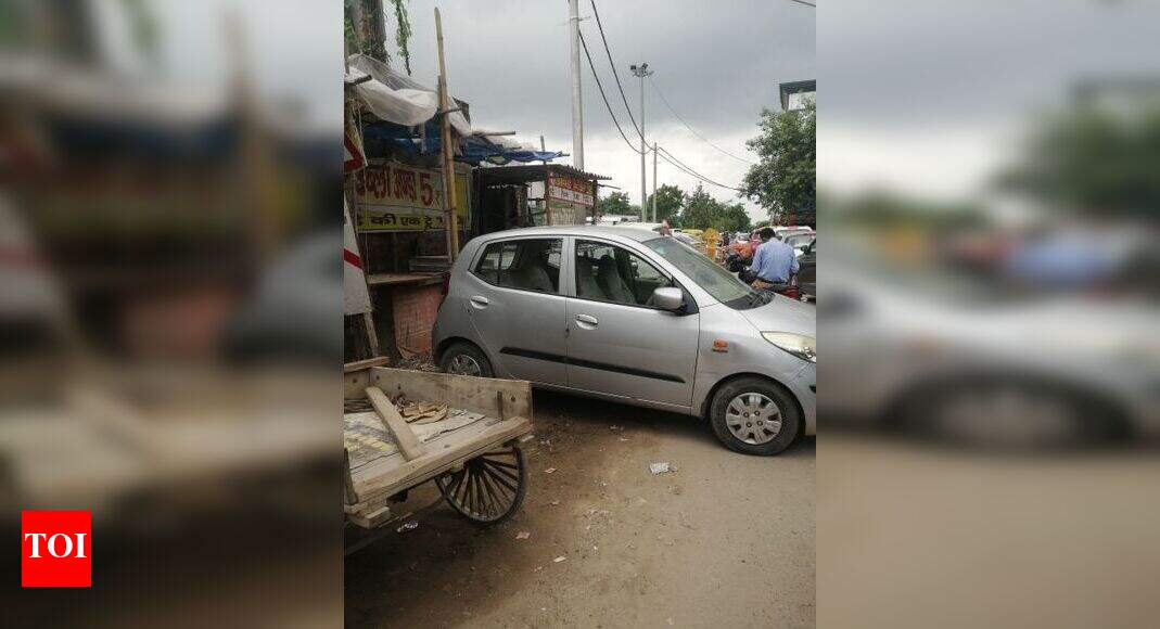 Illegal parking and encroachment - Times of India