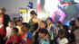 Yashika Aannand dances with children at an event in Coimbatore