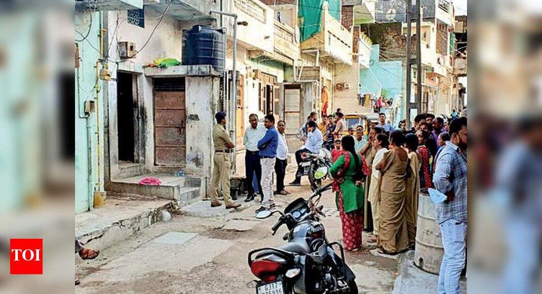 Woman trying to escape cops injured | Vadodara News - Times of India