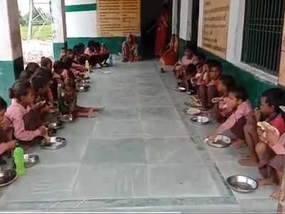 Image result for Uttar Pradesh Chief Minister Yogi Adityanath has ordered a probe into the incident of students being served roti and salt at mid-day meals in a primary government school here.