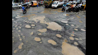 Mumbai civic chief warns of action over potholes