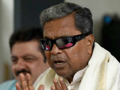 Siddaramiah mocks at Yediyurappa over delay in portfolio allocation, calls him BJP's 'unwanted baby'