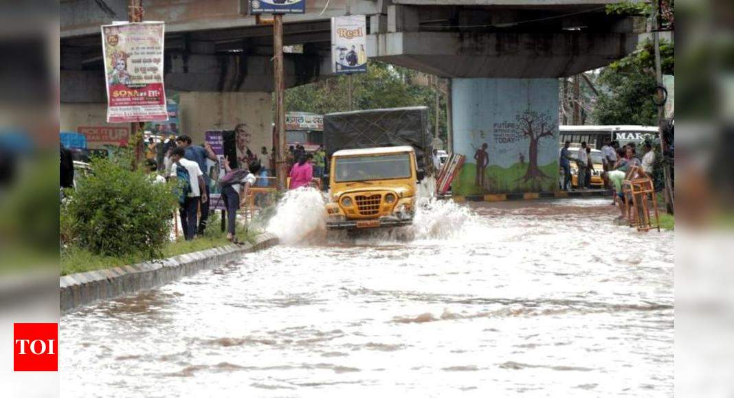 Downpour in afternoon floods roads, inundates low-lying areas ...