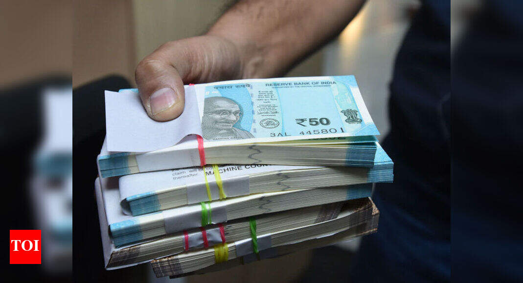 Rupee jumps 53 paise on RBI’s record transfer - Times of India