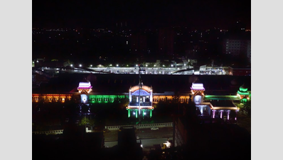 Red and white Egmore Railway Station turns purple, green and gold at night