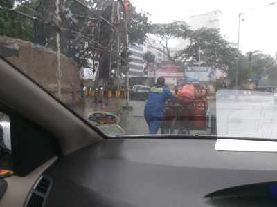 Gas Delivery men in Heavy Rains without Rain coats