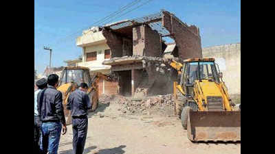 Demolition notices to owners of 98 structures